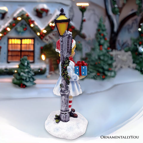Victorian Style Christmas Girl and Street Lamp Tabletop Figurine, 8" Vintage Holiday Statue of a Gift Carrying Belle